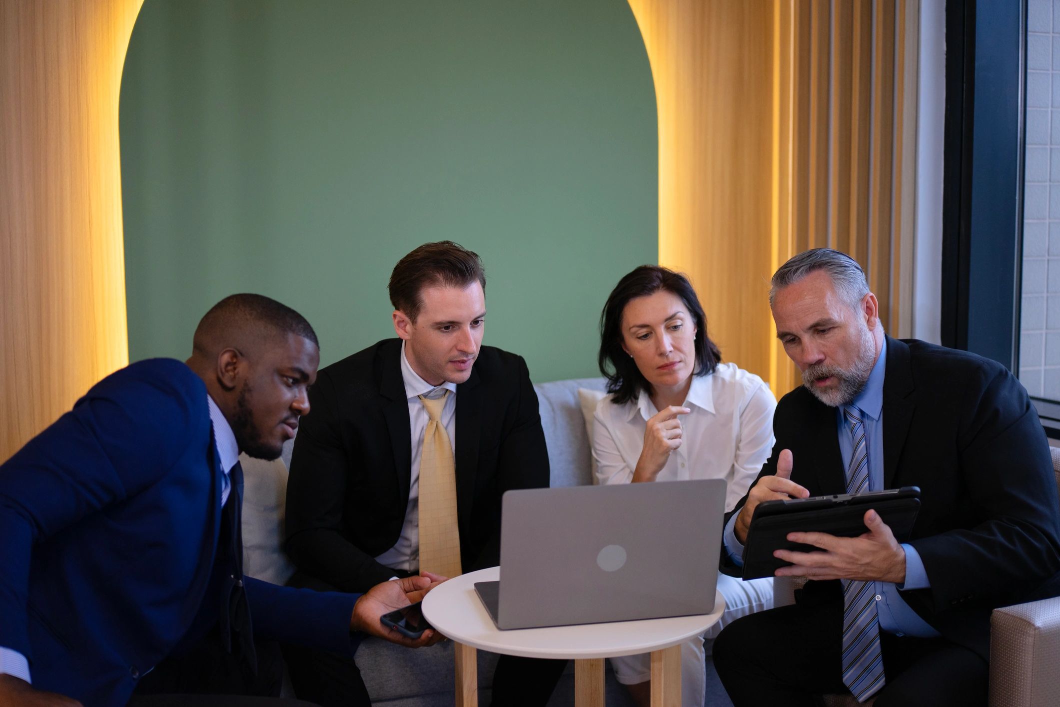 Office team collaborating on compliance monitoring