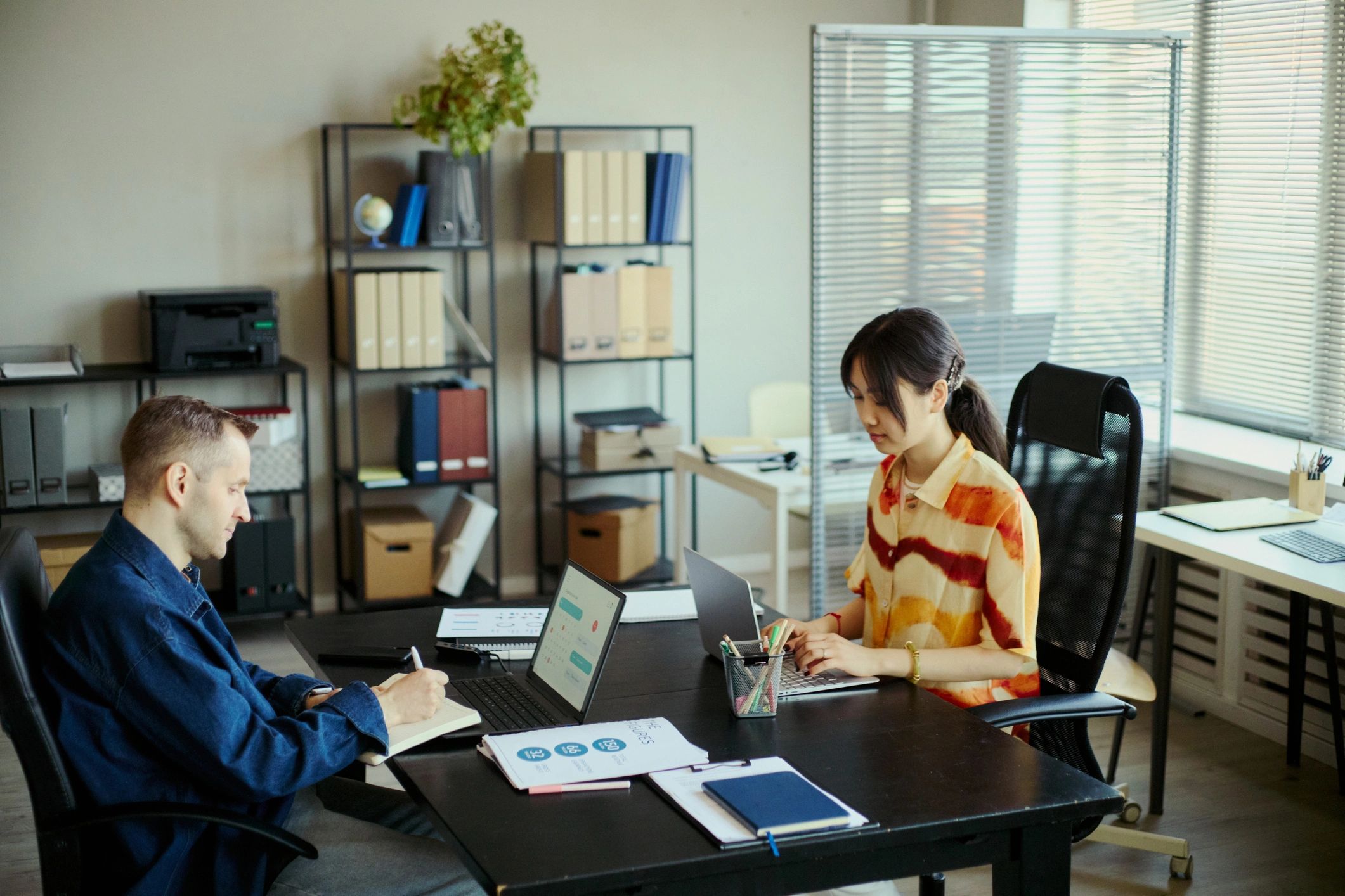 Business team reviewing IT service plans together