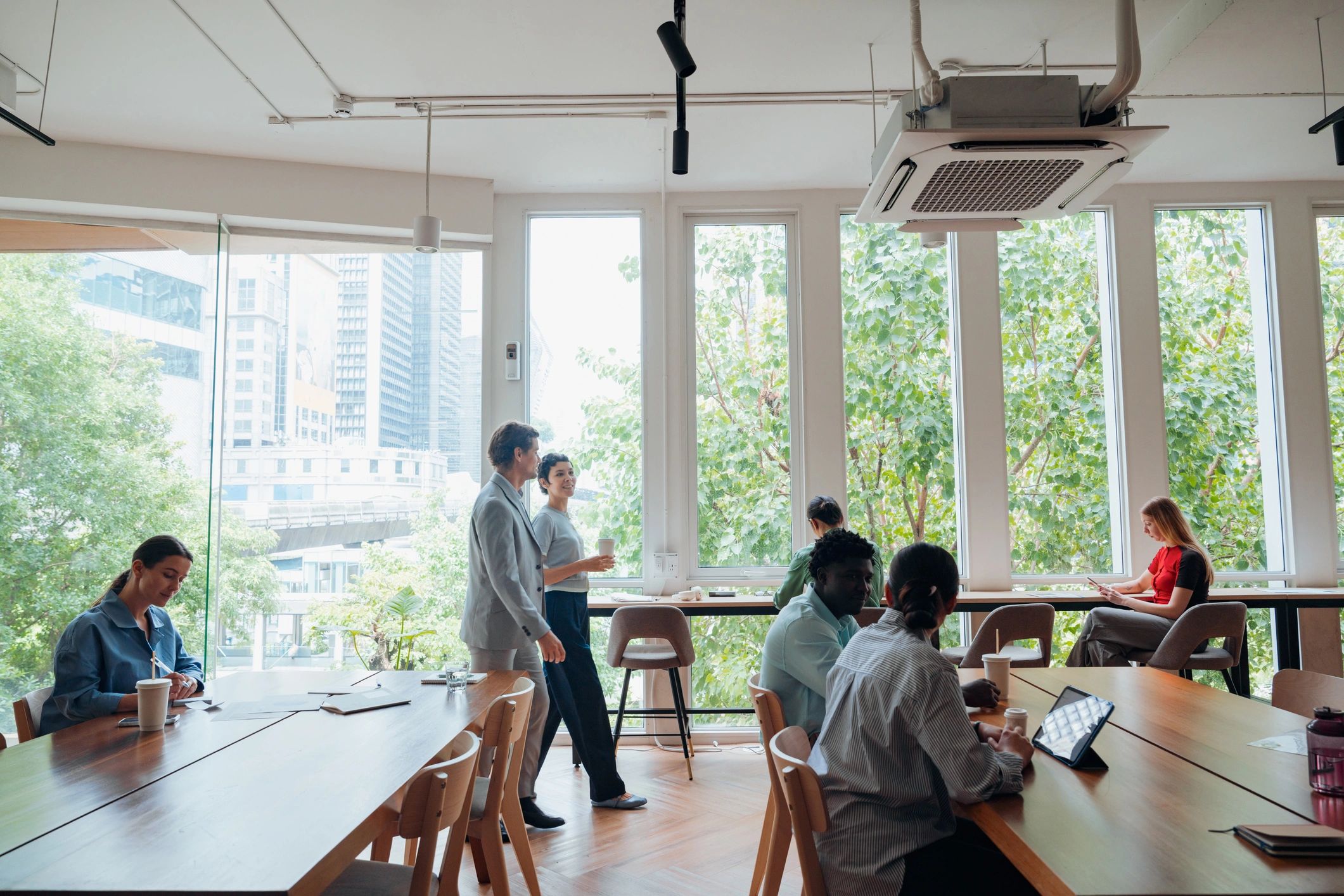 Business professionals working together in a collaborative office
